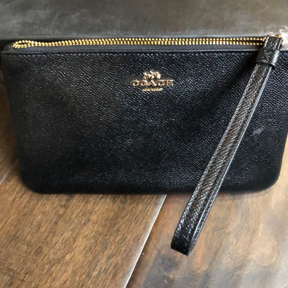 Coach wrislet 8”x 5”